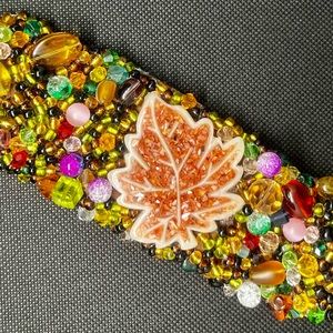 Hand-crafted bead embroidered cuff bracelet.